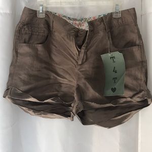 Size 10 T4T bronzey shorts.